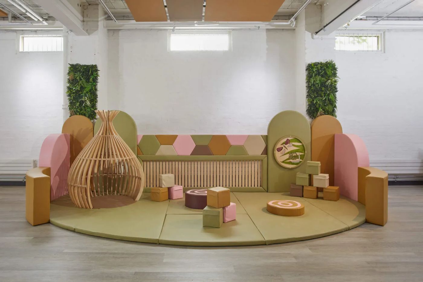 Custom themed playground in soft pastel colours with bespoke play features