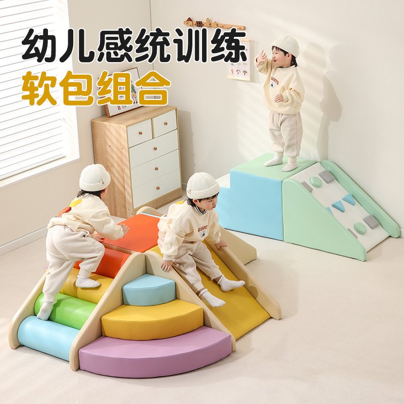 Pastel soft play room for toddlers with soft blocks and mini slide