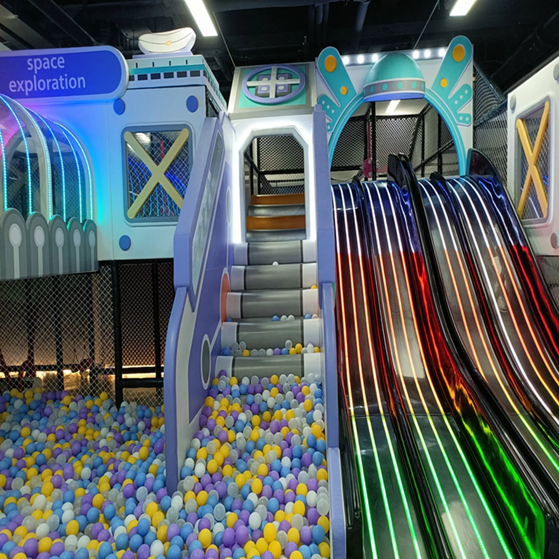 LED rainbow slide and space-themed play capsule